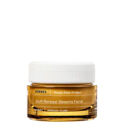 Frasco de creme facial de renovação juvenil da marca Korres, com rótulo amarelo e branco, contendo a descrição "Youth Renewal Sleeping Facial" e "Black Pine Primus".