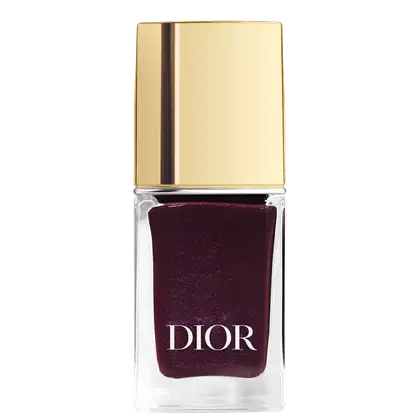 Frasco de esmalte de unhas da marca Dior, em tom de vinho escuro, com tampa dourada e rótulo com o nome da marca em destaque.