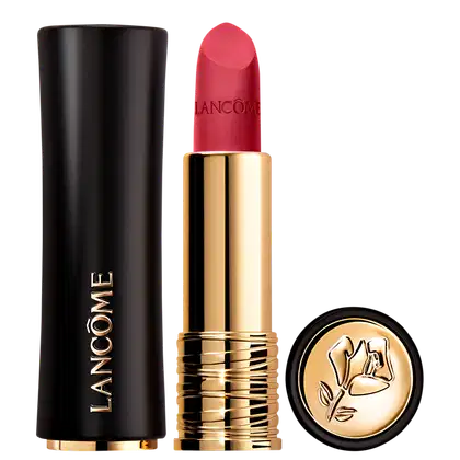 Embalagem preta e dourada de um batom Lancôme de cor vermelha vívida, com o logotipo da marca destacado. Ao lado, um recipiente redondo preto e dourado, provavelmente um produto de maquiagem da mesma marca.