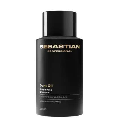 Frasco preto de shampoo da marca Sebastian Professional, com rótulo em dourado destacando o nome da marca e o nome do produto "Dark Oil Silky Shine Shampoo". O frasco possui um design cilíndrico e liso, com tampa preta.
