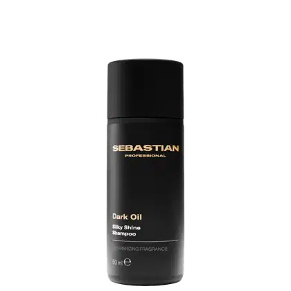 Frasco preto de shampoo da marca Sebastian Professional, com rótulo dourado exibindo o nome da marca e o nome do produto "Dark Oil Silky Shine Shampoo". O frasco possui um design cilíndrico e liso, com capacidade de 50 ml.