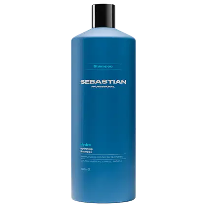 Frasco de shampoo da marca Sebastian Professional, na cor azul, com rótulo destacando o nome da marca e a indicação "Hydro Hydrating Shampoo". O produto é apresentado em embalagem de plástico com tampa preta.