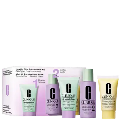 Caixa de kit de rotina de pele saudável para pele seca e mista. Contém limpador, esfoliante, loção clarificante e hidratante. Embalagem com frascos e tubos nas cores verde, lilás e amarelo com logotipo da marca Clinique.