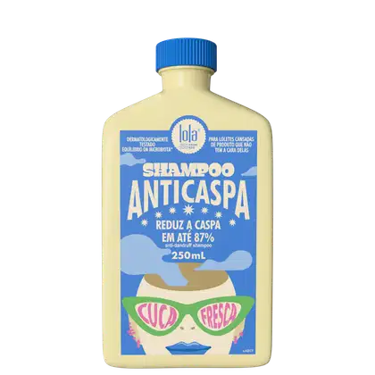 Frasco de shampoo anti-caspa da marca Lola, embalagem de cor amarela e azul, com rótulo destacando que reduz a caspa em até 87%.