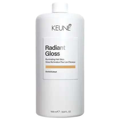 Frasco branco da linha Radiant Gloss da Keune, com rótulo destacando o nome do produto e ingrediente principal, o extrato de orquídea. Embalagem de 1000 ml, com design minimalista e informações sobre o produto.