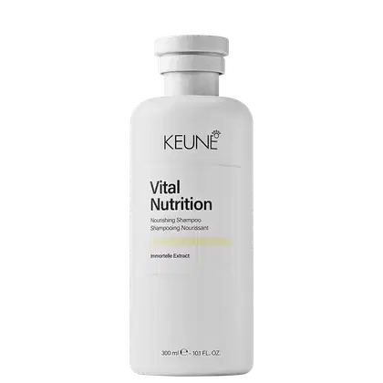 Frasco branco de shampoo da linha Vital Nutrition da Keune, com rótulo preto destacando o nome da marca e o nome do produto "Nourishing Shampoo". O frasco possui um design cilíndrico e tampa arredondada, com informações sobre o volume de 300 ml.