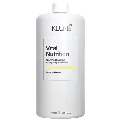 Frasco branco da linha Vital Nutrition da Keune, com rótulo em preto e amarelo, contendo shampoo nutritivo.