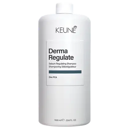 Frasco branco da linha Derma Regulate da Keune, com rótulo destacando o nome do produto e a indicação de que se trata de um shampoo regulador de sebo.