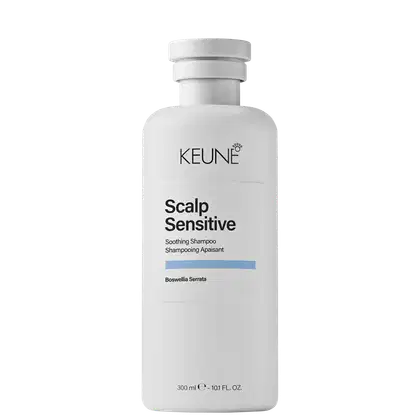 Frasco branco da linha Scalp Sensitive da Keune, com rótulo preto e azul claro.