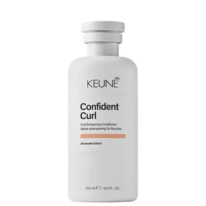Frasco branco da linha Confident Curl da Keune, um condicionador para realçar cachos, com rótulo destacando o nome do produto e ingrediente principal, extrato de amaranto.