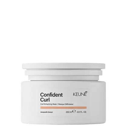 Embalagem branca cilíndrica com rótulo preto e laranja da linha Confident Curl da Keune, contendo máscara para realçar cachos com extrato de amaranto, com capacidade de 250 ml.