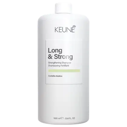 Shampoo da marca Keune, com rótulo indicando o nome "Long & Strong" e é apresentado em embalagem cilíndrica com tampa brancos e texto preto.
