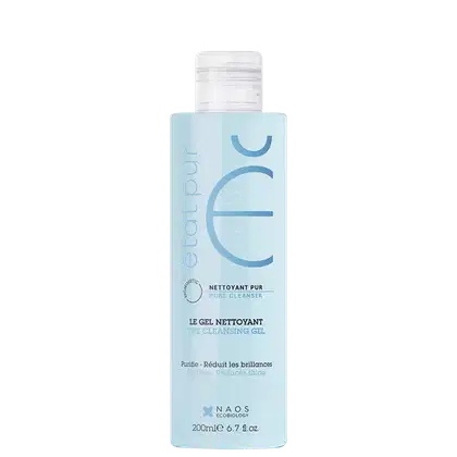 Frasco de item de perfumaria de cor azul claro com rótulo branco. O rótulo exibe o nome da marca "Naos" e o texto "Le gel nettoyant" (O gel de limpeza). O frasco possui uma tampa branca e contém 200 ml do produto.