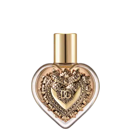 Frasco de perfume em formato de coração dourado com detalhes florais e decorativos, embalagem elegante e luxuosa.