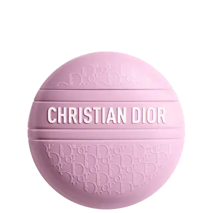 Baume Dior D-Line Le Baume Limited Edition em formato esférico, com textura e padrão gravados na superfície. O texto "CHRISTIAN DIOR" está destacado em branco na parte frontal do produto.