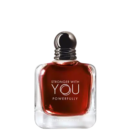 Frasco  e caixa do perfume com formato esférico e tampa prateada. O líquido vermelho exibe o texto "STRONGER WITH YOU POWERFULLY" em letras brancas. O produto é apresentado em fundo preto, destacando sua aparência elegante e sofisticada.