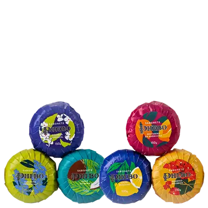 Sabonetes Phebo em embalagens redondas com diferentes cores e texturas, incluindo verde, azul, rosa e amarelo, com rótulos destacando fragrâncias como Alfazema Provençal, Coco da Bahia, Limão Siciliano e Goiaba Bourbon.