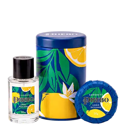 Conjunto de produtos de perfumaria da marca Phebo, incluindo um frasco de colônia, um sabonete em barra e uma lata decorativa, todos com design tropical em tons de azul, verde e amarelo.