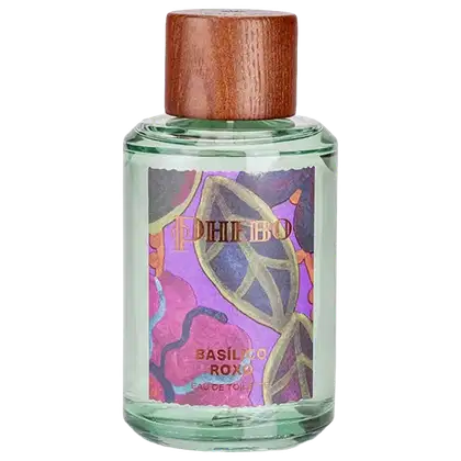 Frasco de item de perfumaria da marca Phebo, com rótulo roxo e amarelo, contendo ilustrações florais e texto "Basilic roxo" em destaque.