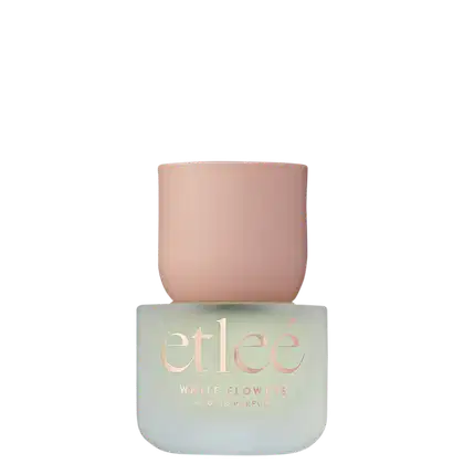 Frasco de perfume Etleé White Flowers com embalagem transparente, contendo informações sobre a marca e o nome do produto em letras douradas.
