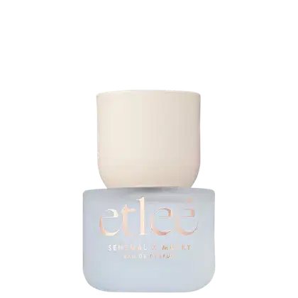 Frasco de perfume Etleé fosco e detalhes em dourado. Rótulo com o nome da fragrância "Sensual & Musky" em destaque.
