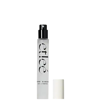 Frasco de perfume Etleé Woody & Musk com atomizador preto e tampa branca ao lado