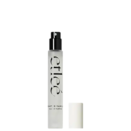 Frasco de perfume Etleé com nome da marca e do perfume "Toasted Vanilla Eau de Parfum" em fonte elegante. Embalagem compacta e moderna, com bico pulverizador.