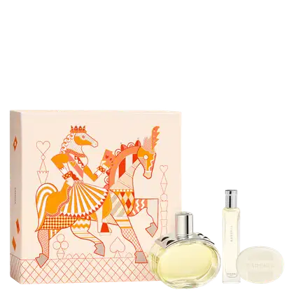 Conjunto de produtos da marca Hermès, incluindo um frasco de perfume Barénia, um sabonete, um perfume travel size e uma caixa decorada com ilustração colorida de cavalos estilizados.