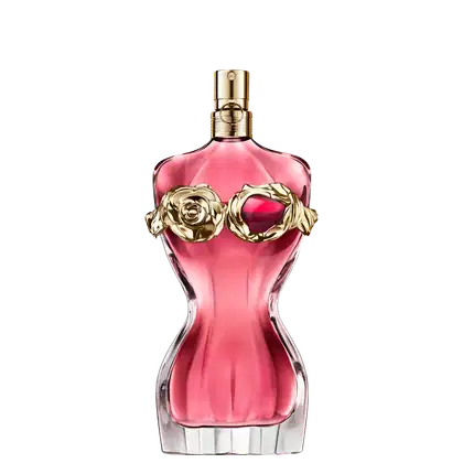Frasco de perfume Jean Paul Gaultier com formato curvilíneo e tampa dourada. O frasco exibe uma silhueta feminina, destacada por um detalhe floral dourado e um toque granada, preenchido com um radiante líquido rosa-alaranjado.