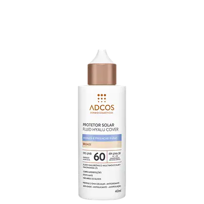 Protetor solar fluido Hyalu Cover da marca Adcos, com FPS 60 e embalagem branca e tampa dourada. Contém ácido hialurônico e promete hidratar e preencher rugas.