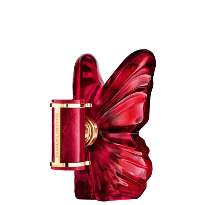 Frasco de perfume Carolina Herrera em formato de borboleta, com tampa dourada e corpo em tom vermelho intenso, destacando-se pela sua forma escultural e elegante.