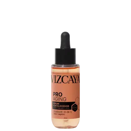 Frasco de vidro com conta-gotas preto contendo um sérum anti-envelhecimento da marca Vizcaya, com rótulo em laranja e branco destacando os ingredientes vitamínicos.