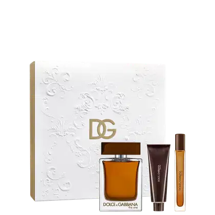 Caixa branca com detalhes florais em relevo, contendo um frasco de perfume Dolce & Gabbana The One, acompanhado de um tubo de shower gel e um frasco menor, em embalagem de presente.