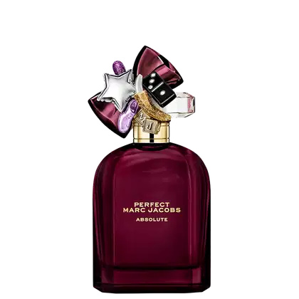 Frasco de perfume da linha Perfect Marc Jacobs Absolute, em tom vinho escuro com detalhes em dourado e decoração com estrela, laço e outros elementos brilhantes.
