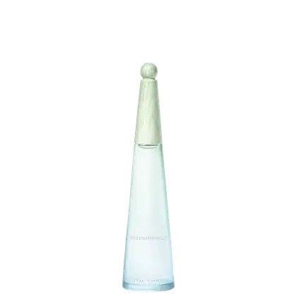 Frasco de vidro em formato cônico com tampa esférica, em tons de verde claro, com rótulo com a inscrição "Eau Essentielle" em letras brancas.