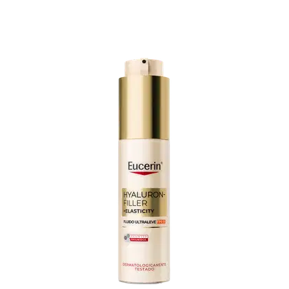 Frasco de produto Eucerin Hyaluron-Filler + Elasticity, com embalagem dourada e branca, contendo fluido ultralevê com FPS 30, com rótulo destacando os ingredientes-chave e a indicação de ser dermatologicamente testado.