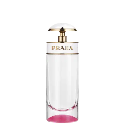 Frasco de perfume Prada com design elegante em branco e dourado. Recipiente cilíndrico com tampa arredondada e detalhes metálicos. Rótulo com o nome da marca em destaque.