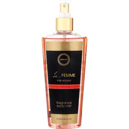 Frasco de spray de corpo com rótulo preto e dourado, contendo o texto "Le Femme for Women" e "Fragrance Body Mist". O frasco possui um design elegante e moderno, com uma tampa dourada.