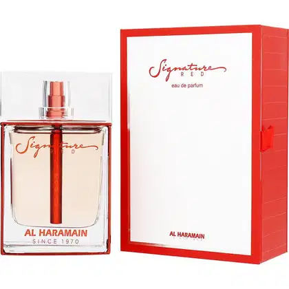 Frasco de perfume Al Haramain Signature Red em embalagem vermelha e branca. O frasco possui formato retangular com tampa e rótulo em vermelho com o nome da marca.