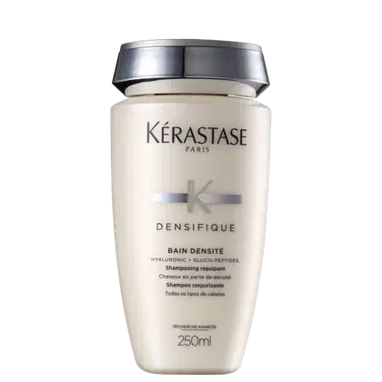 Frasco de shampoo Kérastase Densifique Bain Densite, com 250ml de capacidade, em embalagem branca e prata, com rótulo destacando os ingredientes-chave de ácido hialurônico e gluco-peptídeos.