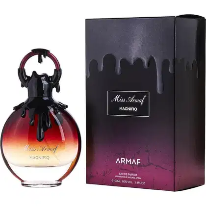Frasco de perfume Miss Armaf Magnifiq em embalagem preta com detalhes em vermelho e laranja. Rótulo com nome da marca e produto em destaque. Produto de 100ml com 80% de concentração.