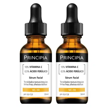 Dois frascos de soro facial da marca Principia, contendo 10% de vitamina C e 0,5% de ácido ferúlico. Os frascos possuem embalagem de vidro âmbar com conta-gotas preto e rótulo com informações sobre o produto.