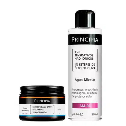 Dois produtos da marca Principia: um frasco de Água Micelar com rótulo preto e branco, e um pote de Creme Hidratante com rótulo preto e azul. Ambos os produtos apresentam informações sobre seus ingredientes e benefícios na embalagem.