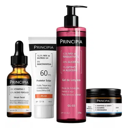 Conjunto de produtos de beleza da marca Principia, incluindo sérum facial, protetor solar, gel de limpeza e creme hidratante em embalagens de vidro e plástico com cores predominantes de laranja, rosa e preto.