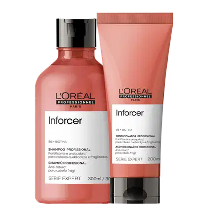Dois produtos da linha L'Oréal Professionnel: um frasco de shampoo Inforcer de 300 ml e um tubo de condicionador Inforcer de 200 ml, ambos com embalagens em tons de rosa e branco, destacando os ingredientes B6 e biotina.