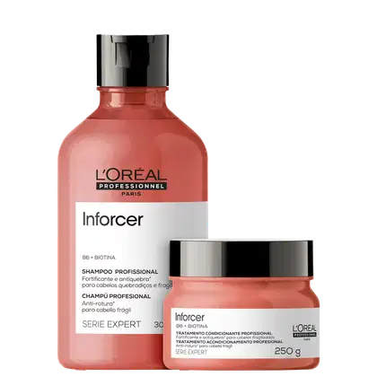 Dois produtos da linha Inforcer da L'Oréal Professionnel: um frasco de shampoo e um pote de tratamento condicionante, ambos em embalagens de plástico com predominância da cor coral.