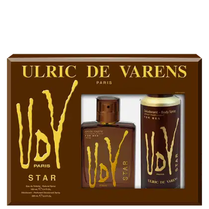 Conjunto de produtos Ulric de Varens, incluindo um perfume em frasco marrom com detalhes dourados, um desodorante corporal em lata dourada e um frasco de spray marrom. Os itens estão em uma caixa retangular marrom com o logo da marca em dourado.