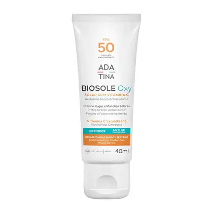 Tubo branco de protetor solar Biosole Oxy da marca Adatina, com FPS 50 e vitamina C, indicado para prevenir rugas, manchas solares e fotoenvelhecimento.
