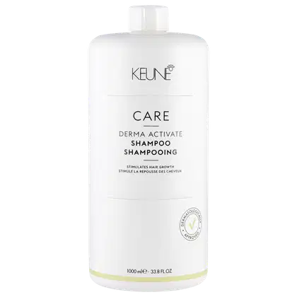 Frasco branco da linha Keune Care, contendo Shampoo Derma Activate que estimula o crescimento capilar, com rótulo em preto e branco destacando o nome da marca e do produto.