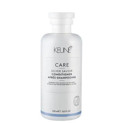 Frasco branco da linha Keune Care, contendo condicionador Silver Savior para tons loiros e prateados, com 250 ml de capacidade e rótulo preto e azul.